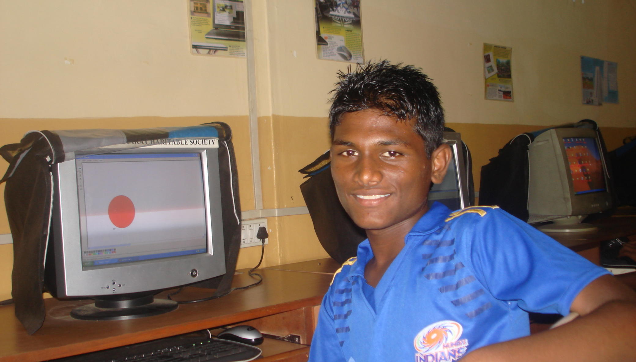 Impart computer literacy to poor children in India